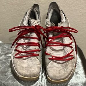 Nike Sneakers with Red Accents